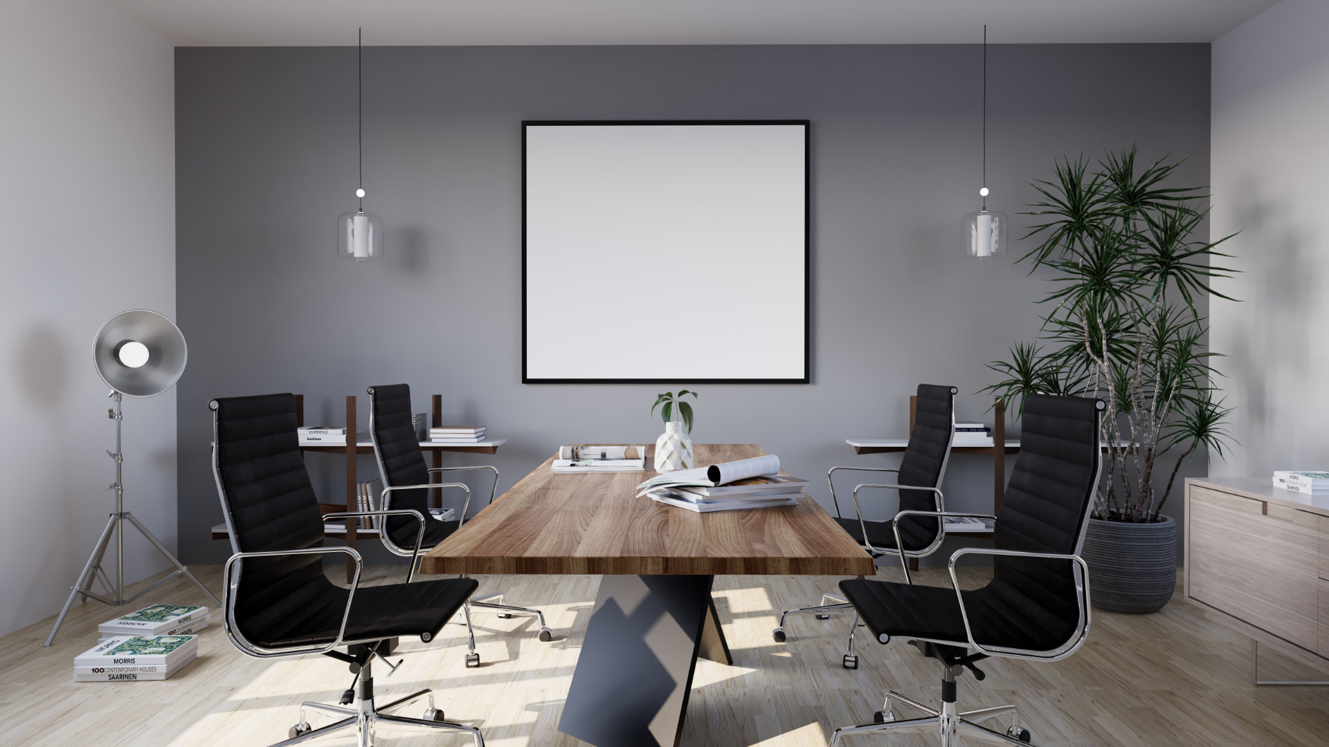Clean, tidy Dubai office meeting room with a wooden conference table, black chairs, a potted plant and dust-free surfaces